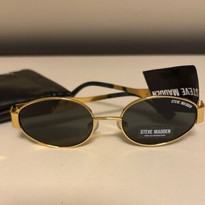 Steve Madden Gold Frame Oval Sunglasses with Dark Lenses